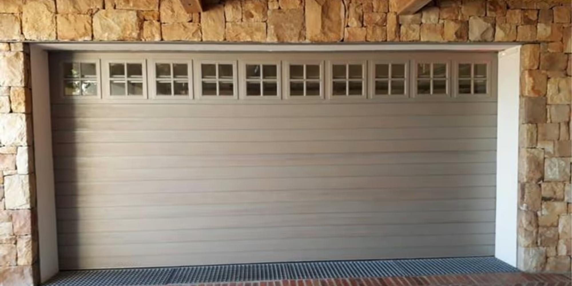 BH4 Doors Timber sectional overhead door with glass panes BH4 Doors Timber sectional overhead door with glass panes
